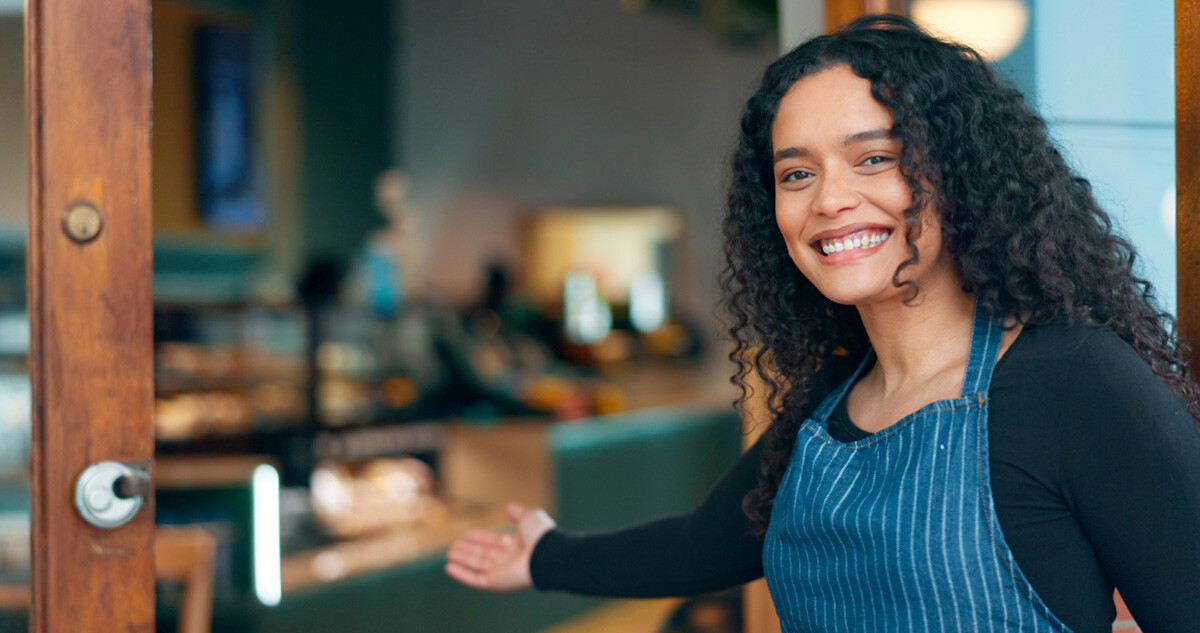 Latina happy restaurant owner