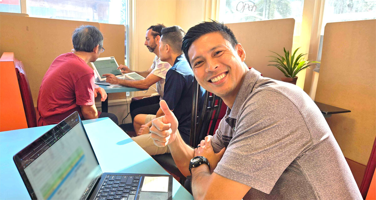 Christian, David from our Hawaii team, helping merchants