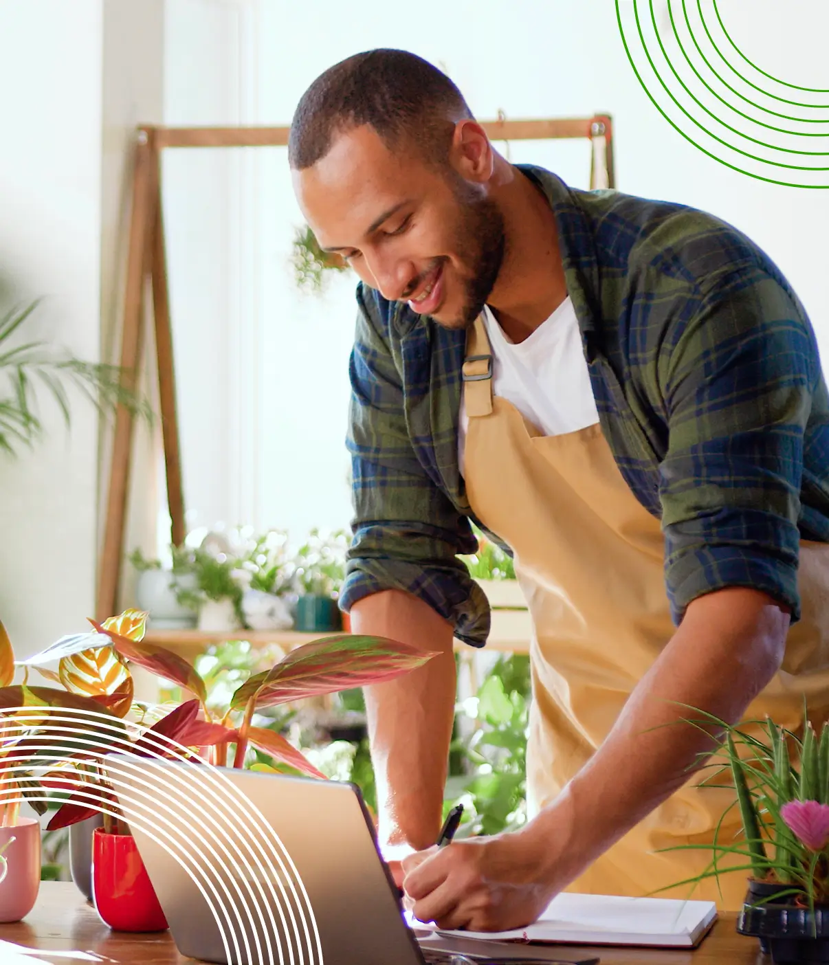 Small business owner working in a plant and garden shop
