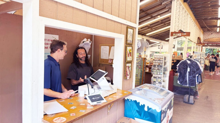 Gravity's team member in Hawaii David, installing a payment processing terminal at a retail mall