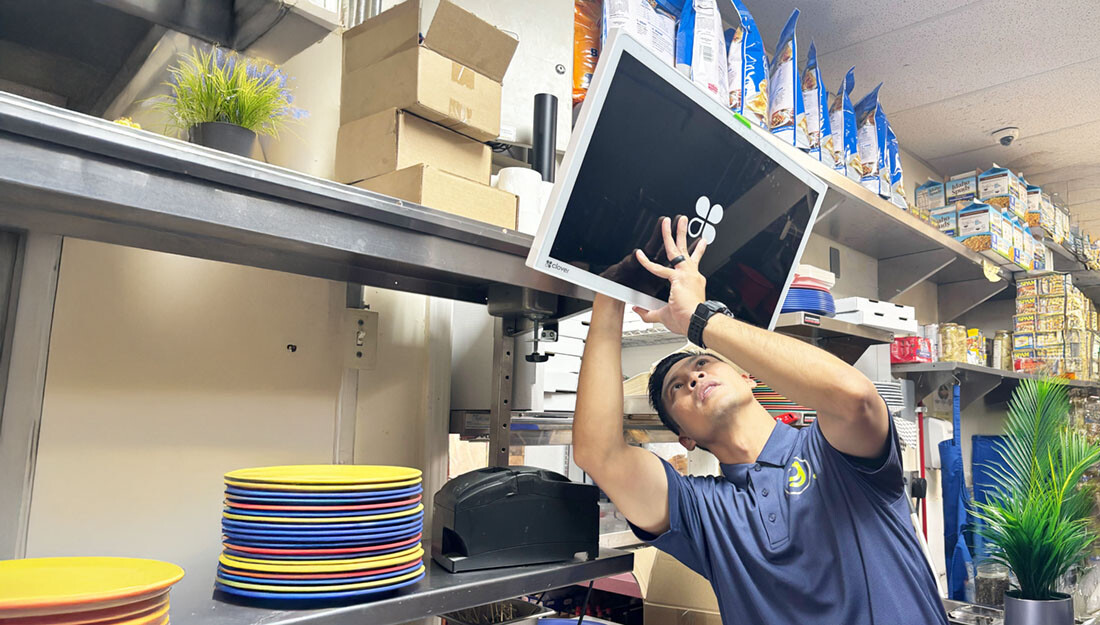 Christian installing a KDS at a local merchant in Hawaii